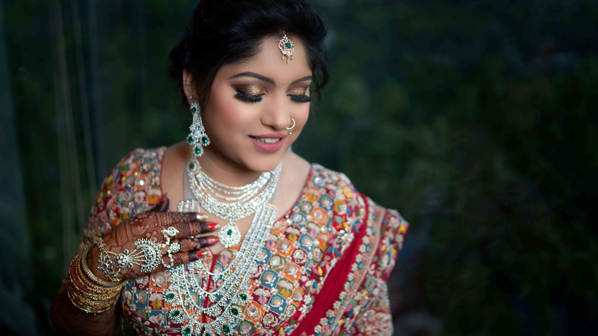 Bride and groom exchanging varmala garlands